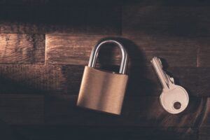 Lock and key on brown table in Vancouver, BC