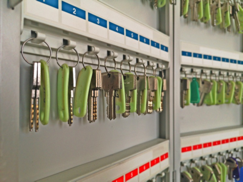 A row of keys neatly hanging on a wall, showcasing various shapes and sizes in Vancouver, BC