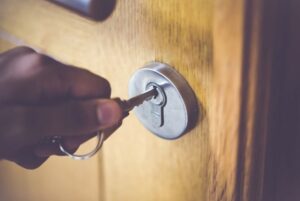 The person opening a door lock in Vancouver, BC