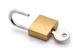 The image of gold color padlock key at Vancouver, BC